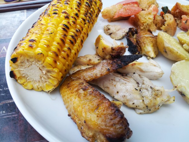southeast spatchcock chook with boozy-braised sweetcorn, potato salad and panzanella
