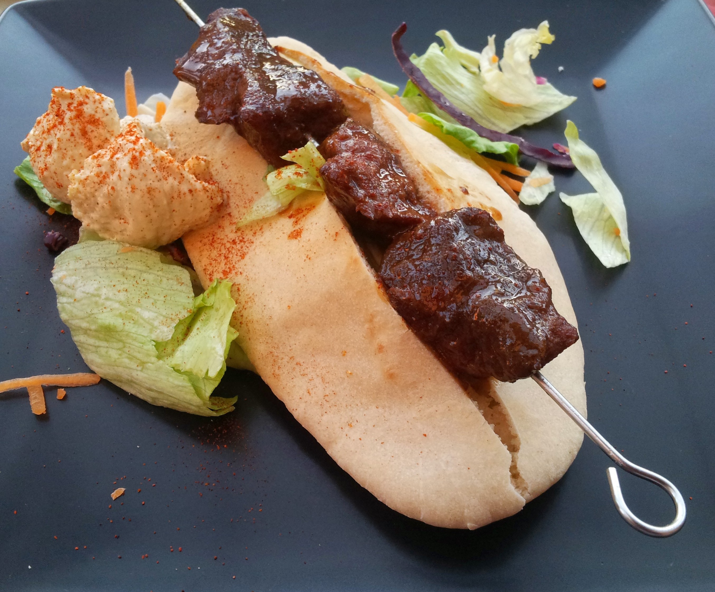 sous vide ox cheek kebab with houmous and pitta
