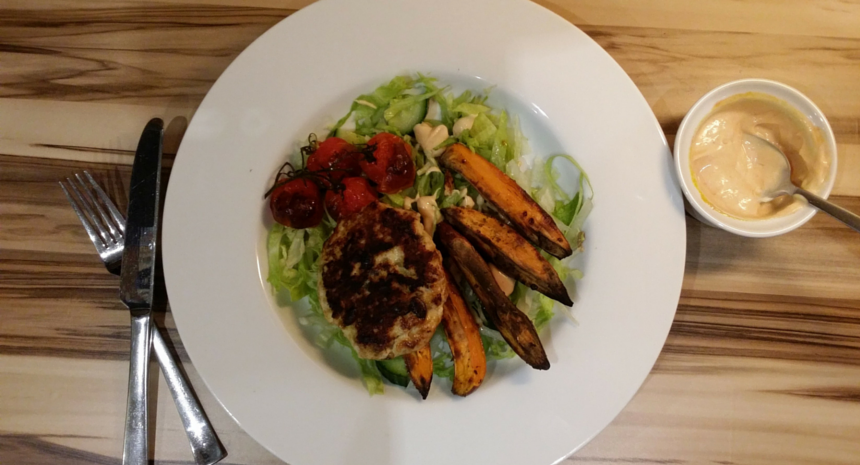 turkey burger bowl with salad and sweet potato fries